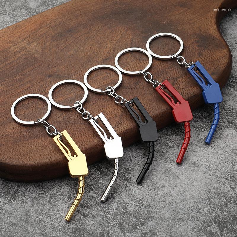 

Keychains Crative Repack Fuel Gun Model Trendy And Cool Tiny Keychain Colorful Exquisite Motorcycle Mountaineering Bag Key Chain