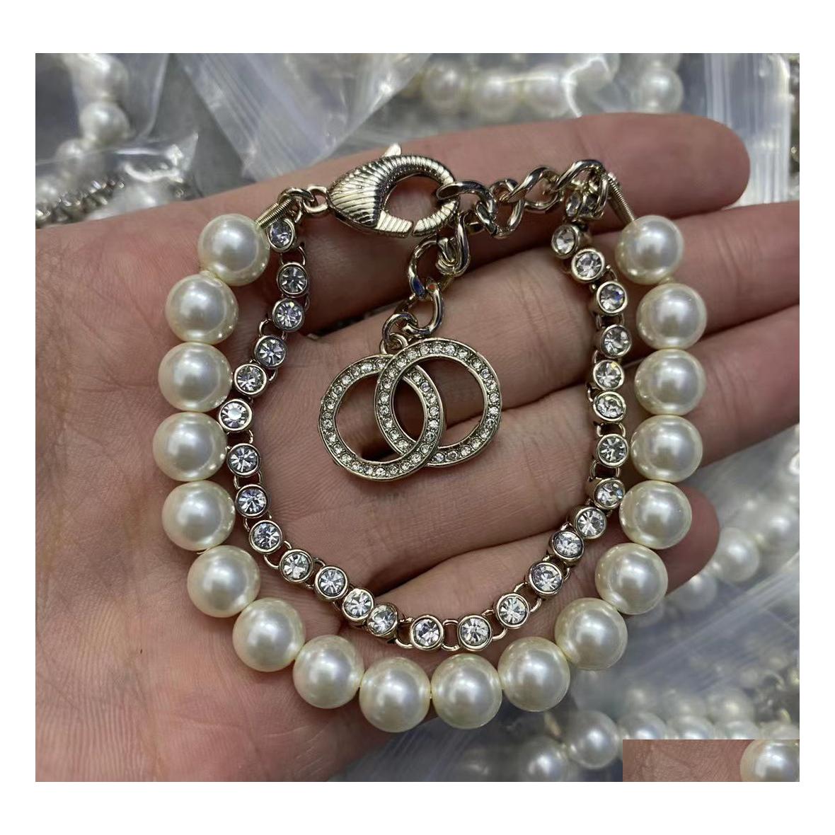 

Charm Bracelets Designer Bracelet Shiny Diamond Luxury Pearl Top Designers Jewelry Ladies Men Love Pendants Comes Very Nice Drop Deli Dh7Bj
