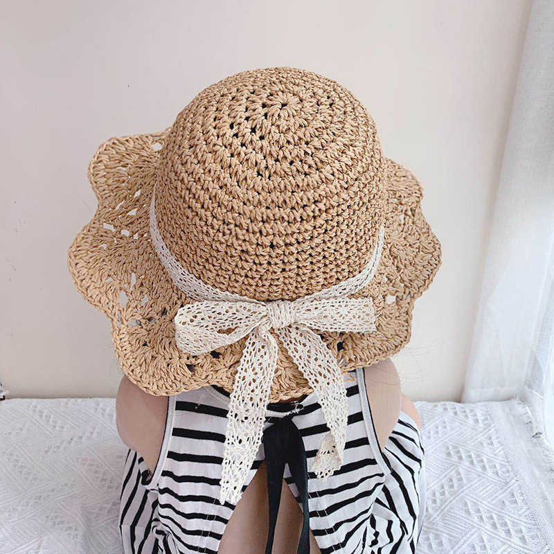 

Caps Hats Fashion Baby Petal Brim Straw Woven Hat Sun Protection Lace Cap Kids Girls Princess Collapsible Beach Cute Infant Bucket Hats 230413, A-beige