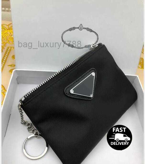 

Luxury Designer key chain Nylon Canvas pouch Men Women Mini Wallets Keychains Black Zip pocket purse Lover Keychains Card holders Keyring Fashion Accessories