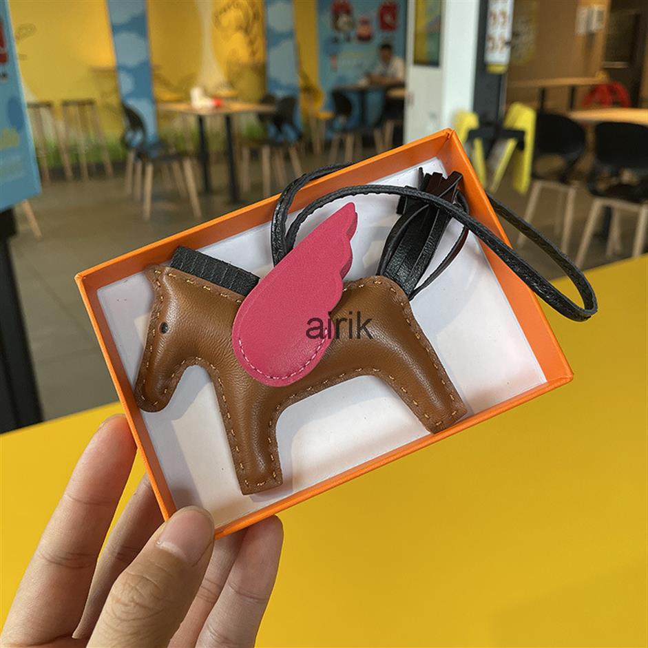 

Brand Swift Sheepskin Horse Bag Charm keychains Luxury Paddock Keyring Real Leather Nano Pegasus Pendant Wing Flying Ornament294Y