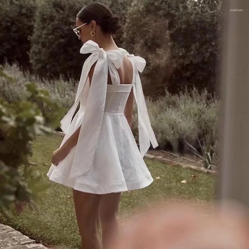 

Casual Dresses Yojoceli Elegant Bow Beach Strap White Dress Summer Women Sleeveless Short Party Female Mini Sundress Vestidos