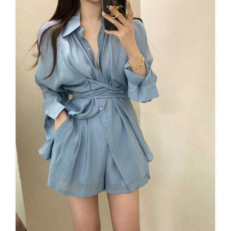 

Sun-Protective Lace Top: Elegant French Design, Irregular Hem, Long Sleeves - Perfect for High-End Fashion and Beachwear, Black