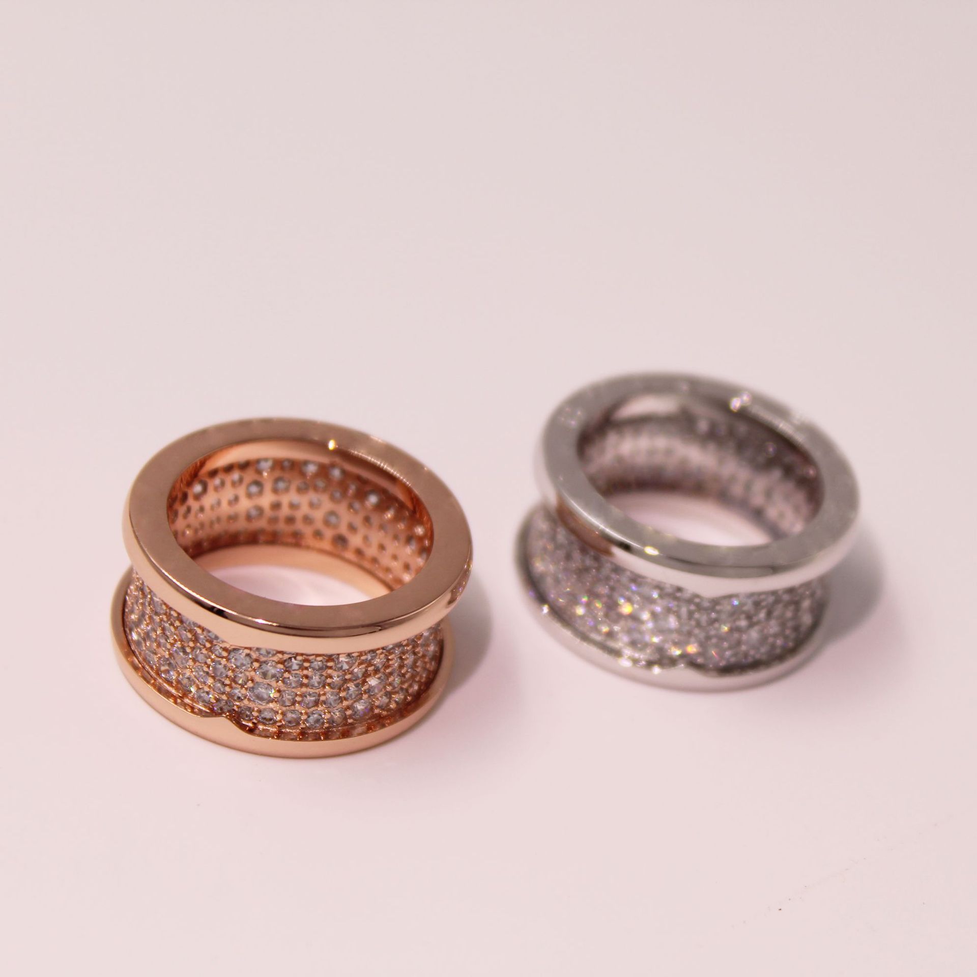 

Branded Ring With Side Stones 18k Gold Filled with Diamond and A Spring-loaded Male Fashion Jewelry Ring.