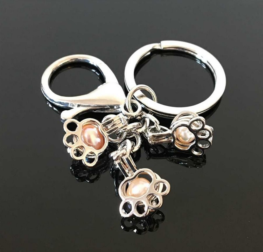 

seahorse pearl cage key ring can open hollow