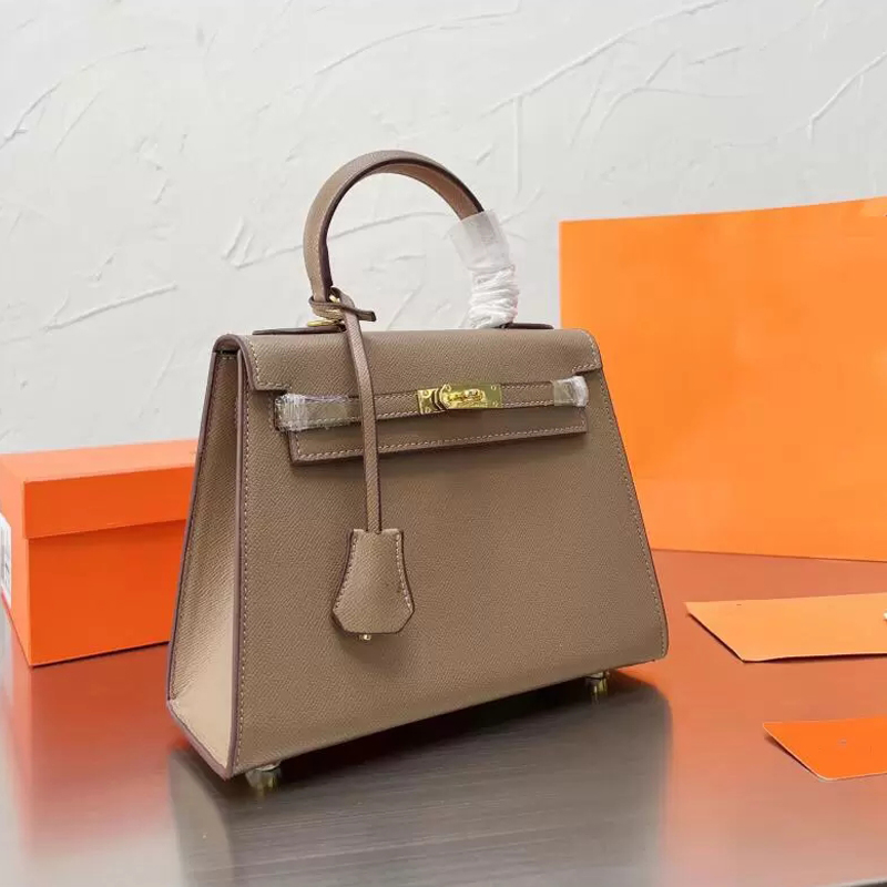 

2023 Top quality fashion designer Women's bag cowhide leather tote bags glamour high quality shoulder handbags strap With box