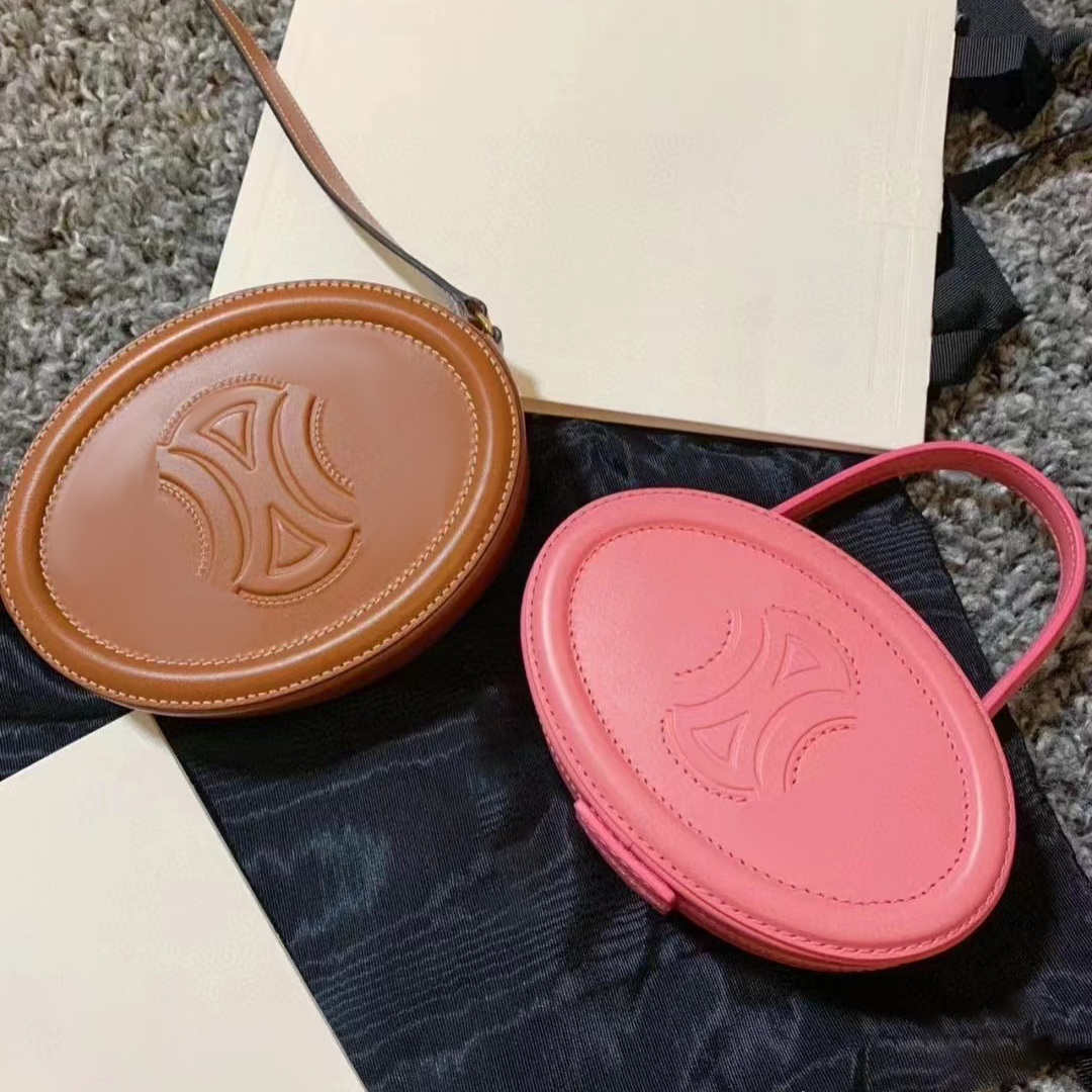 

TRIOMPHES Luxury mens designer bag women Oval Smooth Genuine leather round clutch bags purse satchel Cosmetic handbag the tote bag Calfskin shoulder Crossbody bags, Sky blue