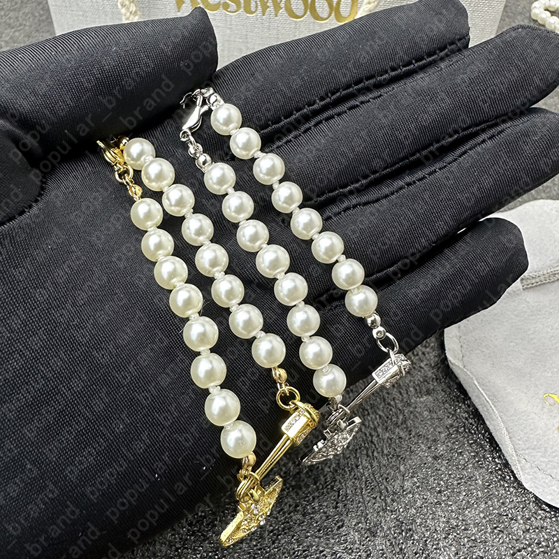 

Classic Vivian Bracelet Women Chakras Beaded Bracelet Saturn Pearl Pin Bracelet Women Planet Diamond Charm Bracelet Gold Silver Bracelet for Woman
