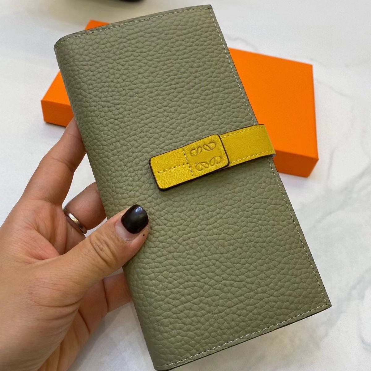 

Designer wallet coin purse card bag LOWE men's and women's fashion brand bump color buckle money clip high-quality leather multi-card storage bag