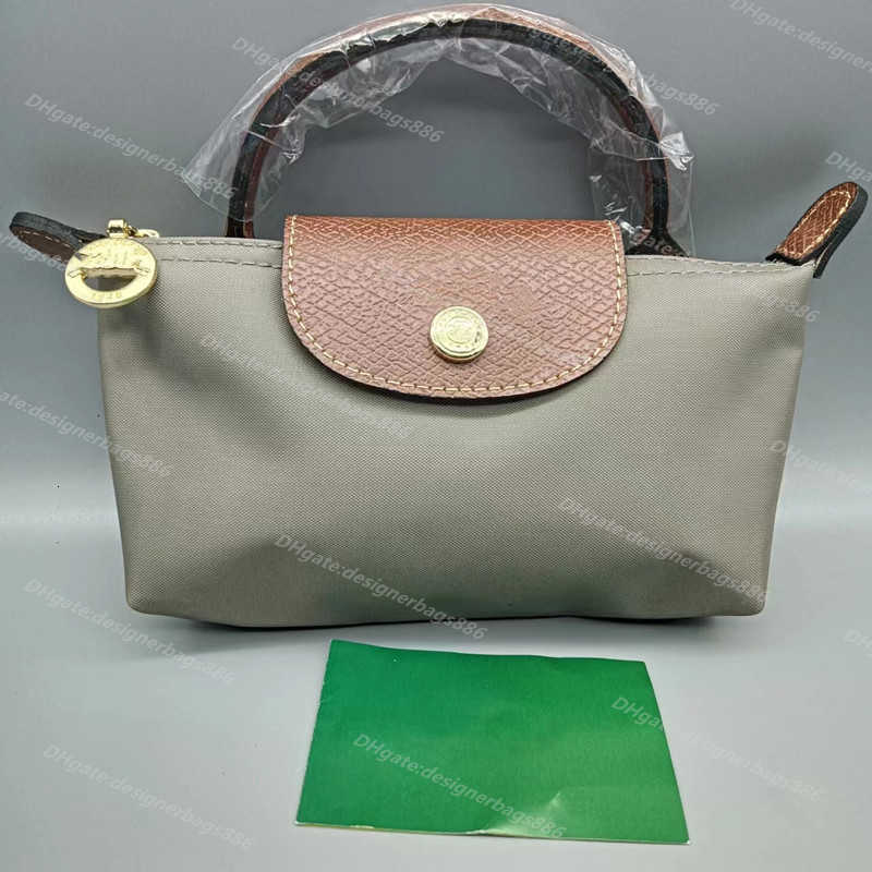 

High quality Wholesale Clearance wallet bags Hand French Capacity European and American Style Longyu Bag Dumpling 2023 Single Nylon Handle Mini luxurys handbags, P65 protection lake blue genuine leather