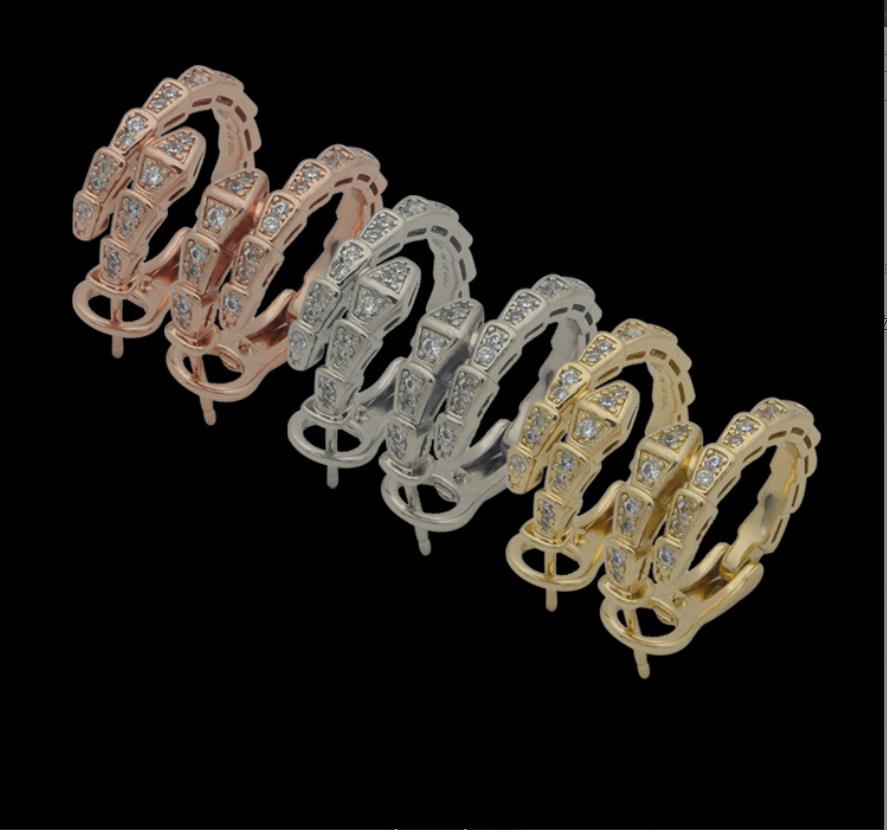 

Dangle & Chandelier High quality luxury jewelry brand European and American fashion couple snake head snake bone earrings with diamond