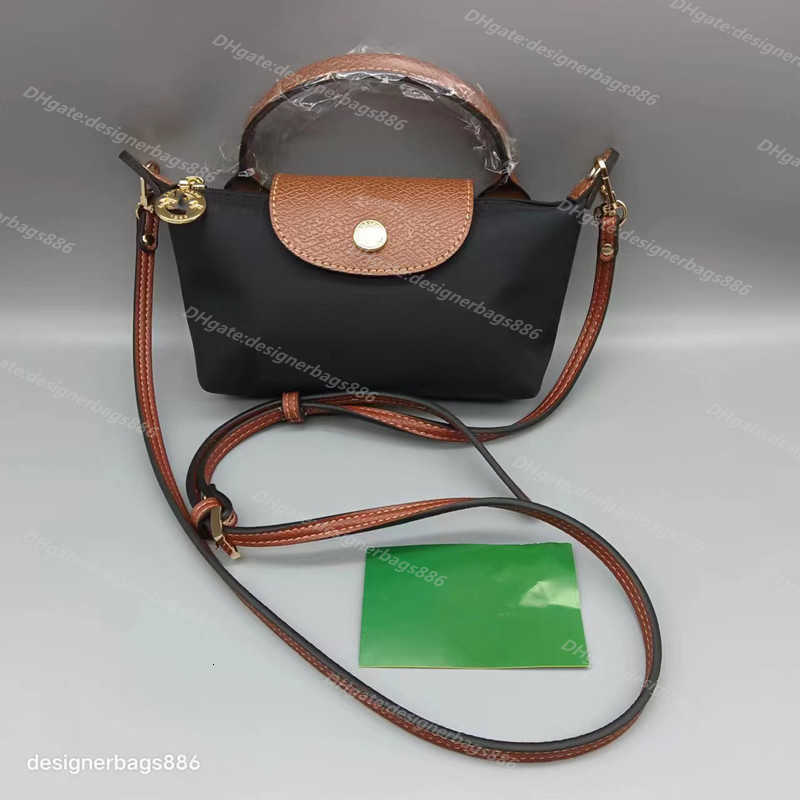 

Handle French designer wallet Wholesale Mini wallet Fashion Handbag derma Reconstruction of Oblique Short Cross Dumpling Bag bags designer women bag Small Girl, Cognac with logo