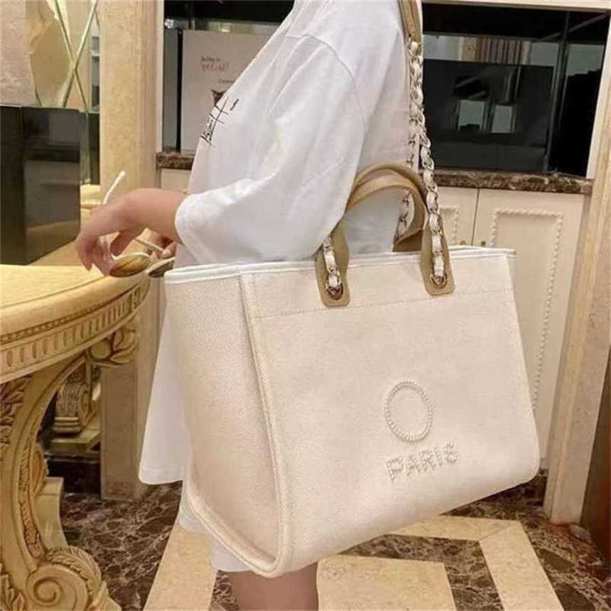 

50% off Luxury Label Pearl Beach Canvas Bag Classic Big Handbags Portable Large Capacity J70m, Beige