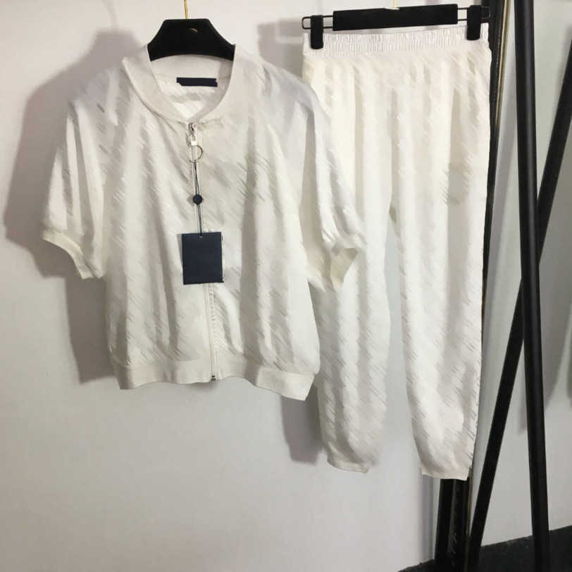 

23ss Womens Tracksuits womens designer clothing Hot drill logo jacquard short sleeve zipper top elastic waist casual trousers set women Clothes a1