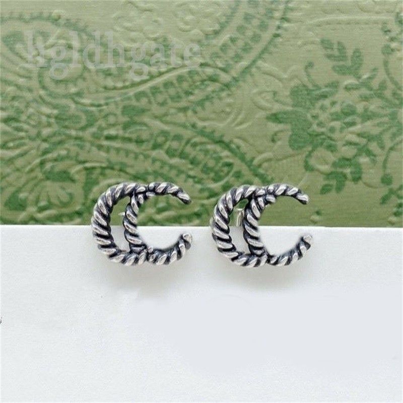 

Plated silvery luxury earrings girls trendy tiktok creative mother s day twisted stud ins small letters style rhinestone metal rock thick Earrings ZB034 F23