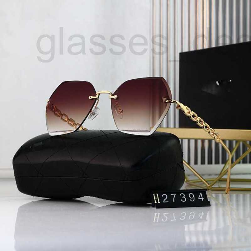 

Sunglasses designer Frameless large frame female sunglasses printed chic new glasses PYVL