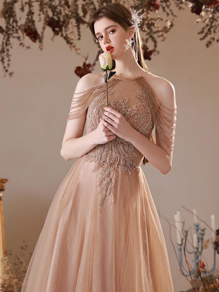 

Runway Dresses Elegant Celebrity Champagne Gold Appliques Beading Tassel Halter Neck Floor Length Party A Line Evening Gowns Host