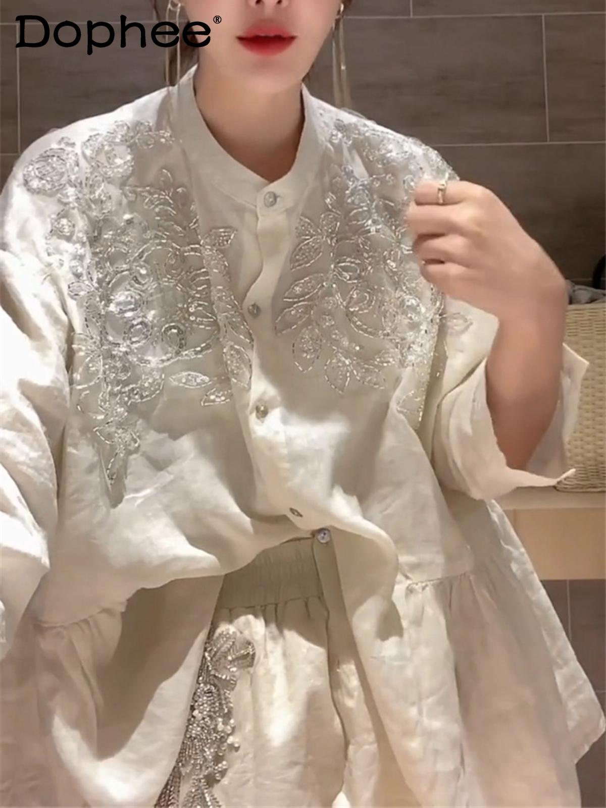 

Dress 2022 SUMMER NEW FASHION SHORTS SUIT ROUND NECK SINGLEBREASTED WHITE SHIRT TOP WOMEN + WIDE LEG SHORTS HEAVY BEADS TWOPIECE SET