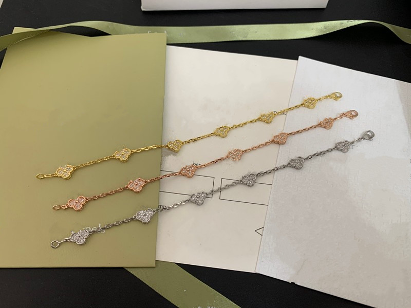 

Luxury designer mini bracelet for women 4 four leaf clover charm bracelet 18K gold jewelry agate shell mother of pearl chain fashion wedding engagement gift