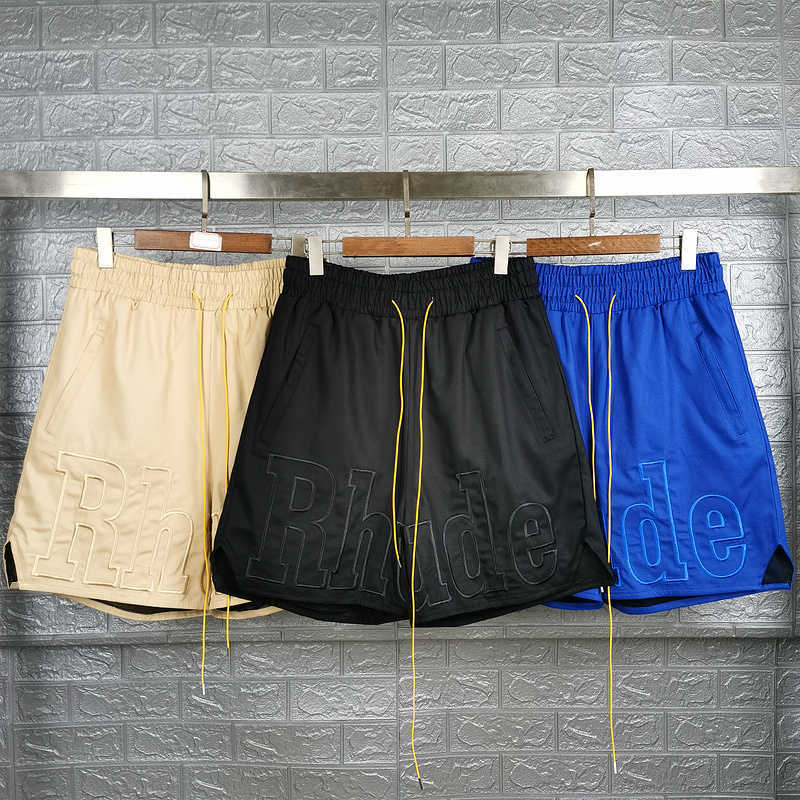 

Designer Clothing short casual Rhude High Street Men's Summer Sports Casual Letter Large Embroidered Loose Beach Shorts Couples Joggers Sportswear Loose fitness, Black