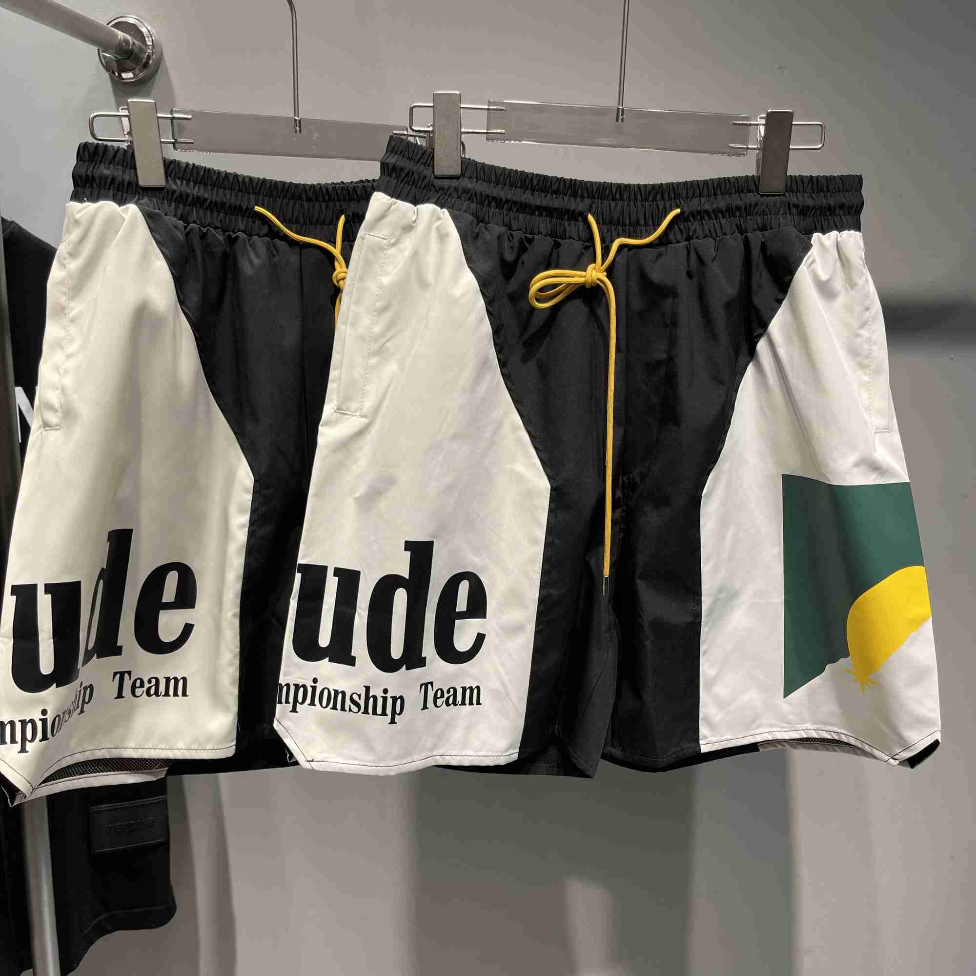 

Designer Clothing American Rhude Sunset Letter Color Block Basketball American Capris Shorts Rhude Men's Beach Pants Couples Joggers Sportswear Beach fitness, Red sunset stitching