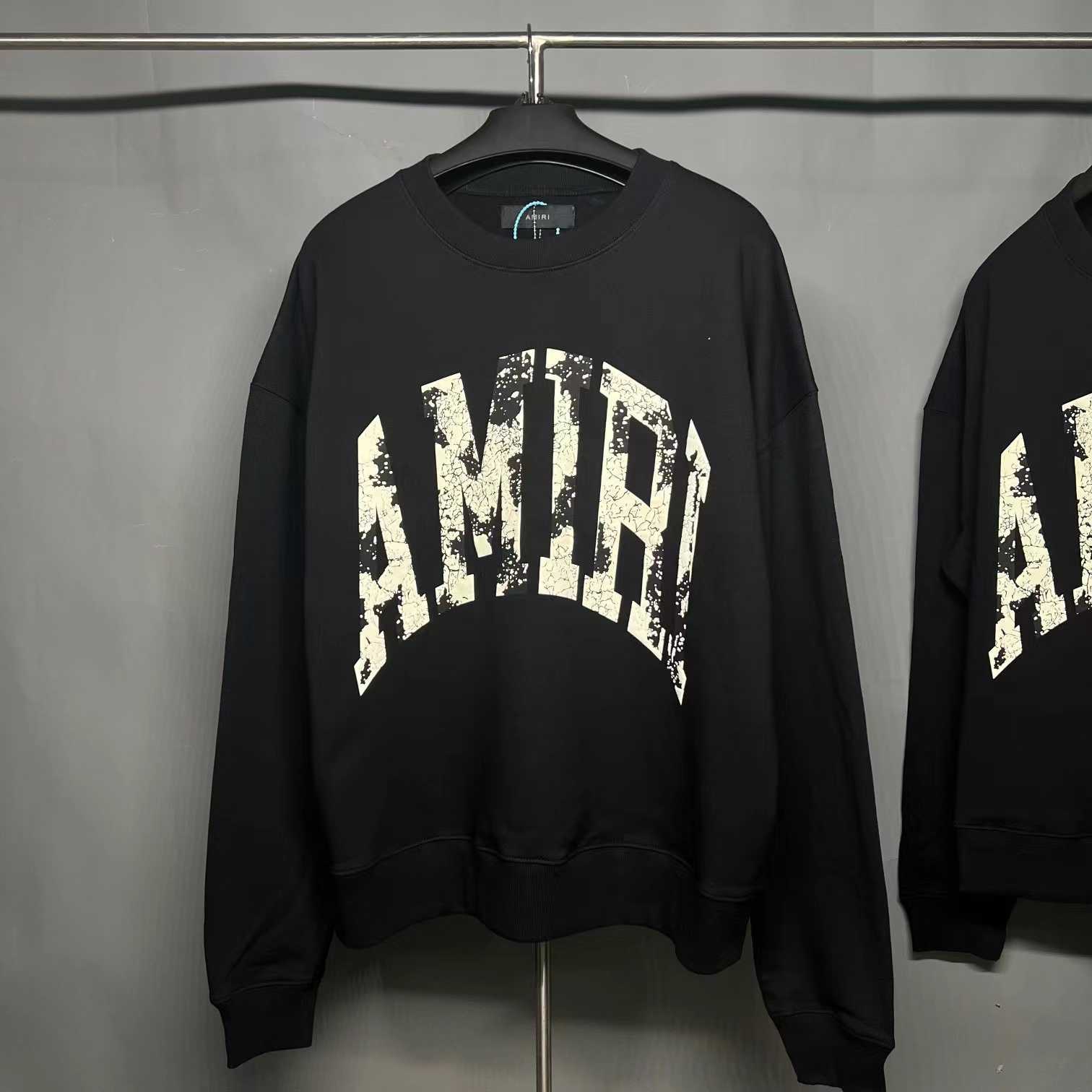 

Designer Clothing Sweatshirts Hoodies Amiiri Letter Slogan Worn Cracked Black White Foam Print High Street Fashion Round Neck Loose Sweater Streetwear for sale, Shipping fee