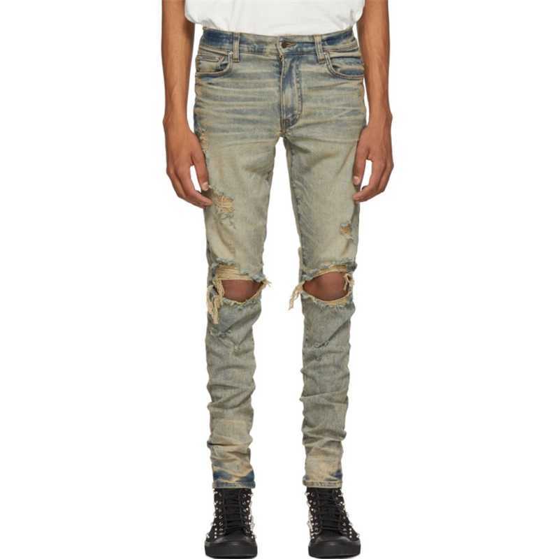 

Designer Clothing Luxury Casual Fashion Denim Pants Amiiri Spring Summer Yellow Mud Dirty Dilapidated Knees Holes Fashion Slim Fit Feet High Street Jeans Men