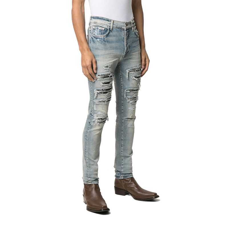 

Designer Clothing Luxury Casual Fashion Denim Pants Amiiri Spring Summer Cashew Flower Worn-out Light Blue Torn Jeans for Men's High Street Slp Long Pants
