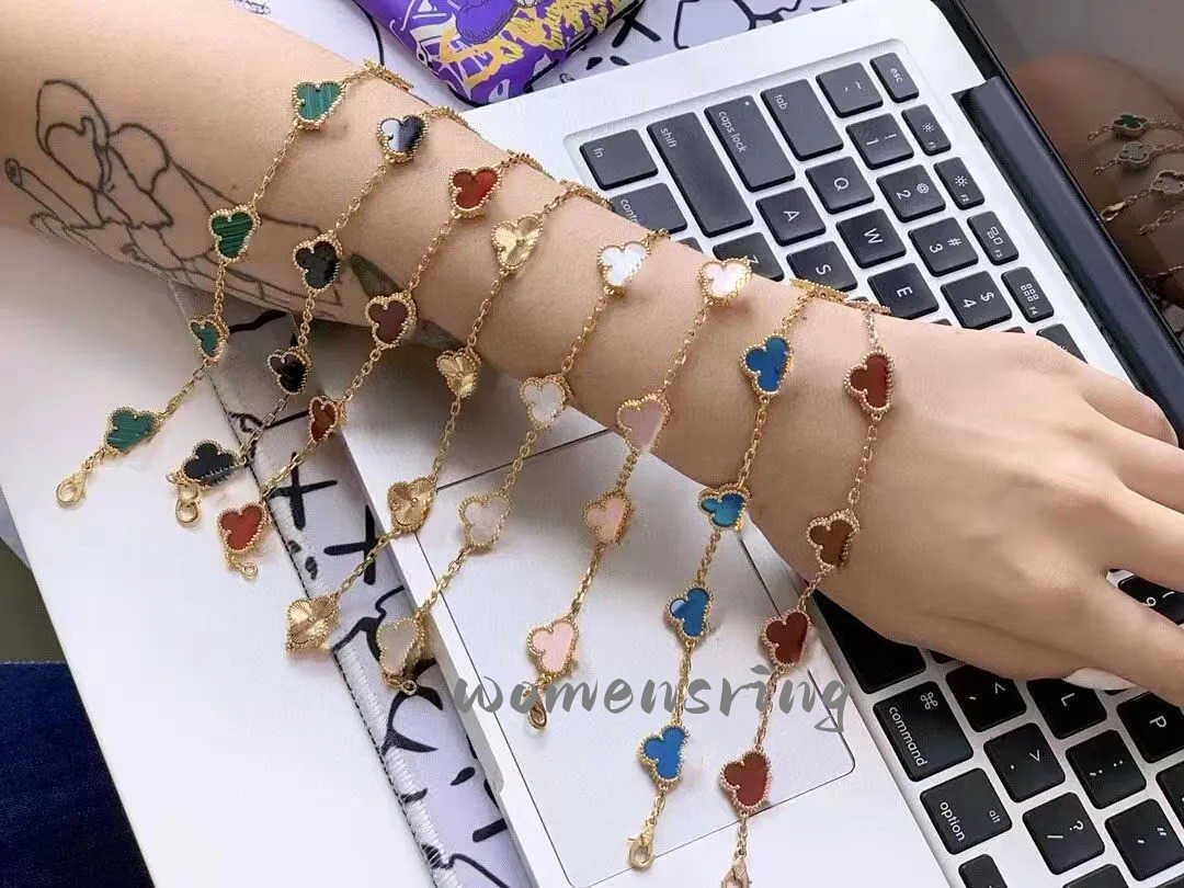 

luxury clover four designer fashion charm bracelets for girls women 18K gold silver black white red green brand bracelet wedding party jewelry