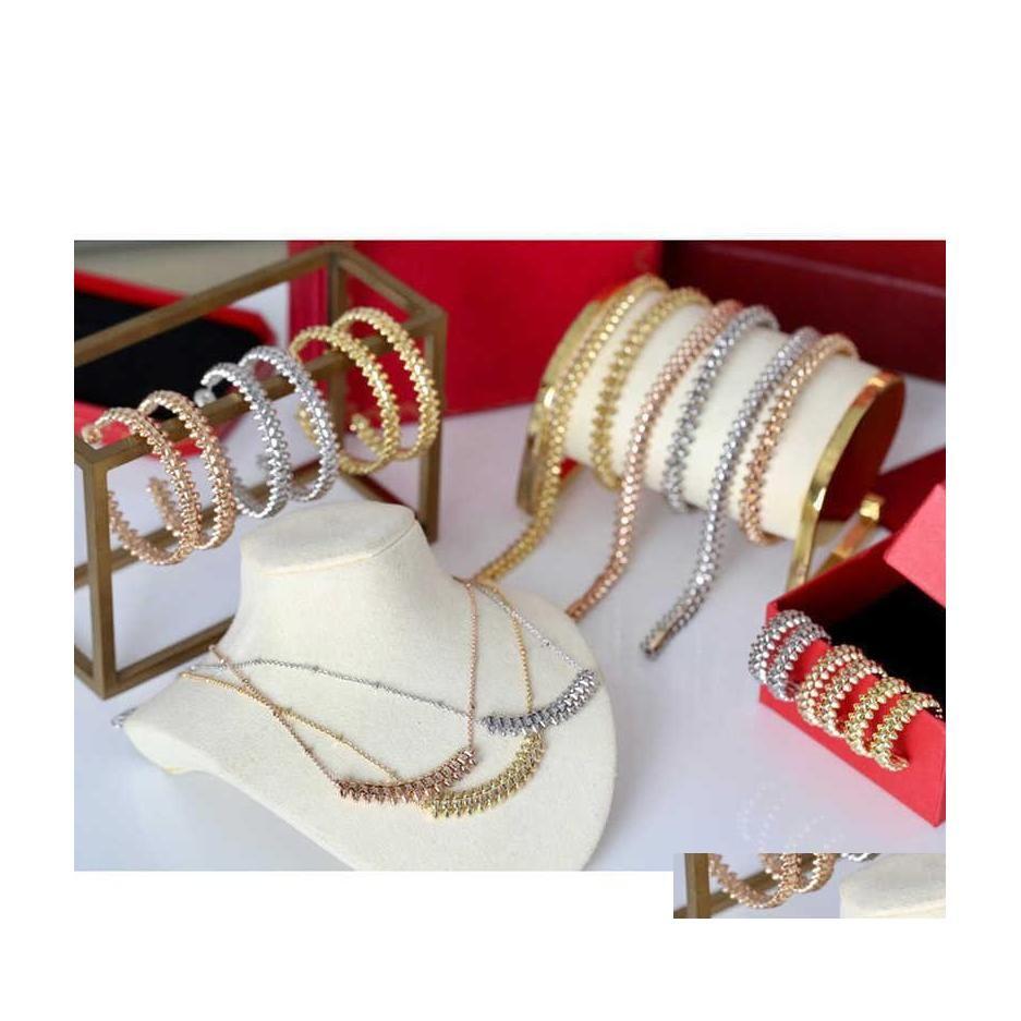 

Bracelet Necklace Brand Fashion Jewelry Set For Women Gold Plated Rive Steam Punk Party Clash Design Earrings Ri Drop Delivery Sets Dhmg2
