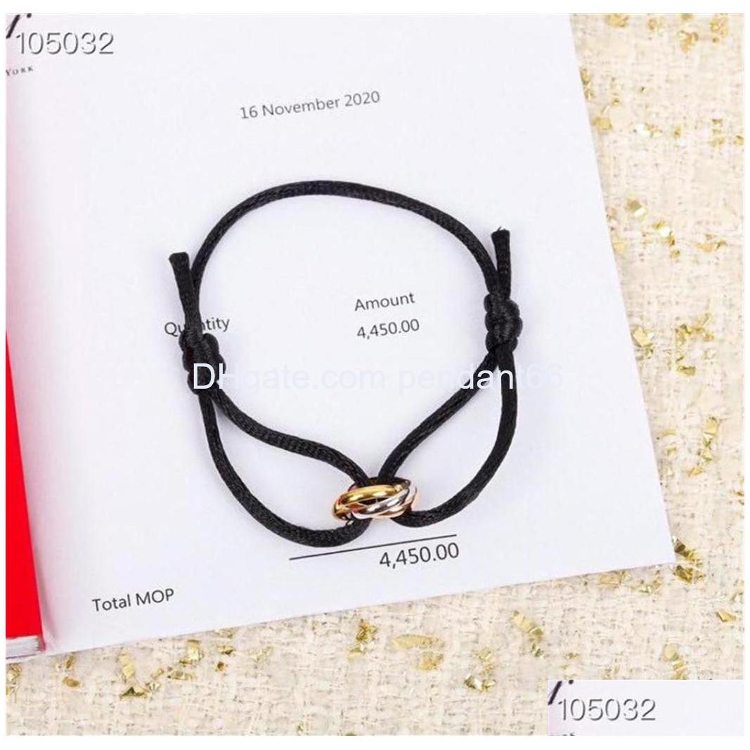

Charm Bracelets Trinity Classic S925 Sterling Sier Bracelet Three Round Circle Double Fabric Rope For Man And Wom5743834 Drop Delive Dhod5