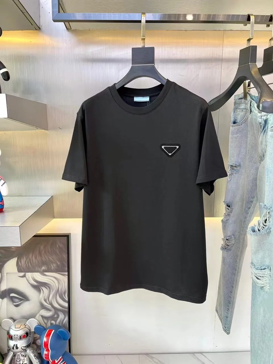 

New men's designer T-shirt, European and American brand clothing, short sleeved, round neck clothing, cotton couple, loose and breathable, sweat-absorbing casual T-shirt