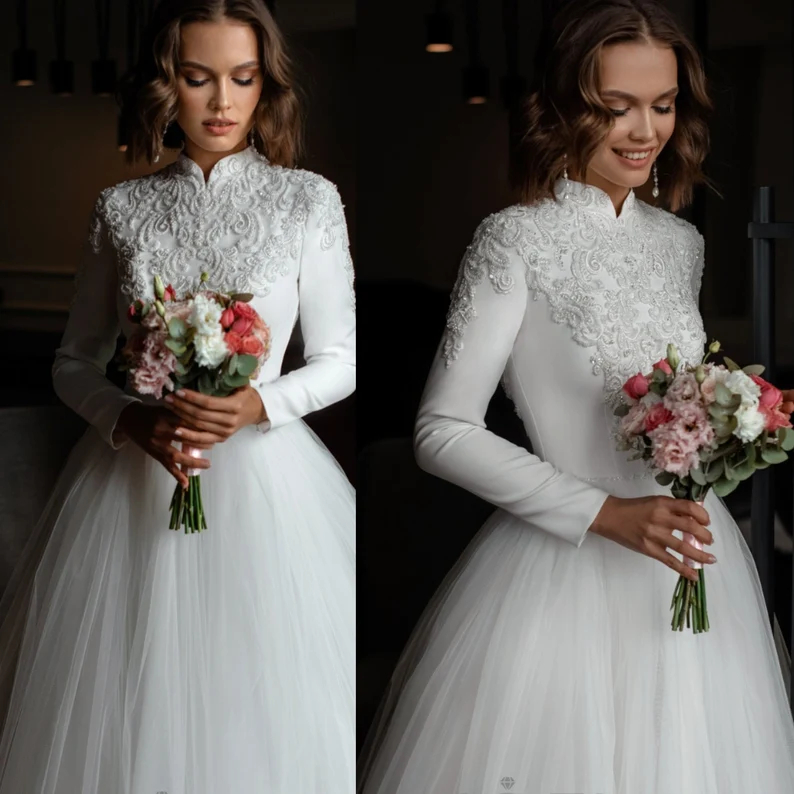 

Modest Muslim A Line Wedding Dresses Beading Applique High Neck Long Sleeves White Tulle Bridal Gowns Back Zipper Court Train Elegant Arabic Bride Wear