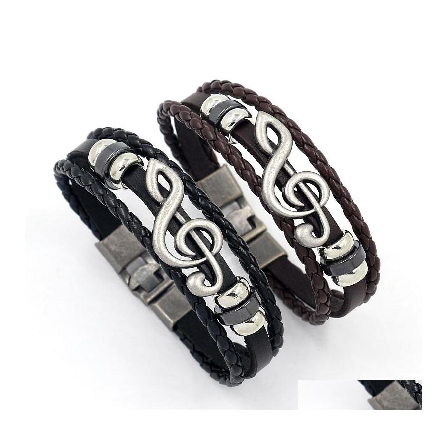 

Charm Bracelets Europe Fashion Jewelry Retro Mens Buckle Alloy Large Music Notes Leather Bracelet Drop Delivery Dh4Rt
