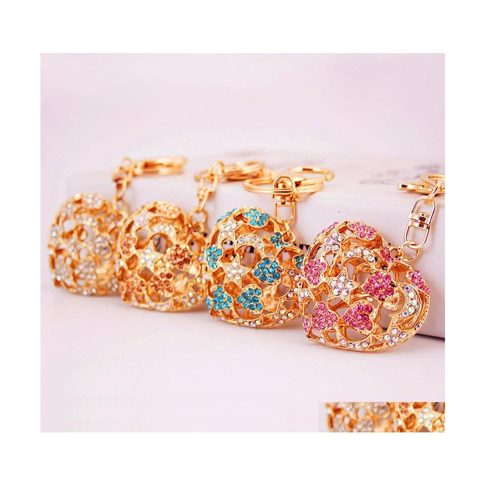 

Key Rings Est Bag Charm Hollow Style Floral Rhinestone Crystal Heart Pendant Metal Car Keychain Lobster Clasp Alloy Keyring 504 H1 D Dhvdg