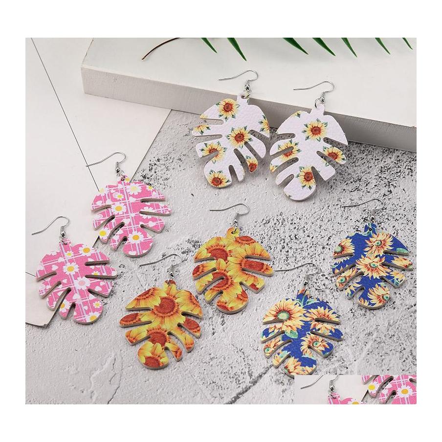 

Charm Fashion Leaf Leather Earrings Hollow Fish Bone Pattern Earring Sunflower Print Faux Dangle For Women Party Jewelry Drop Deliver Otzhd