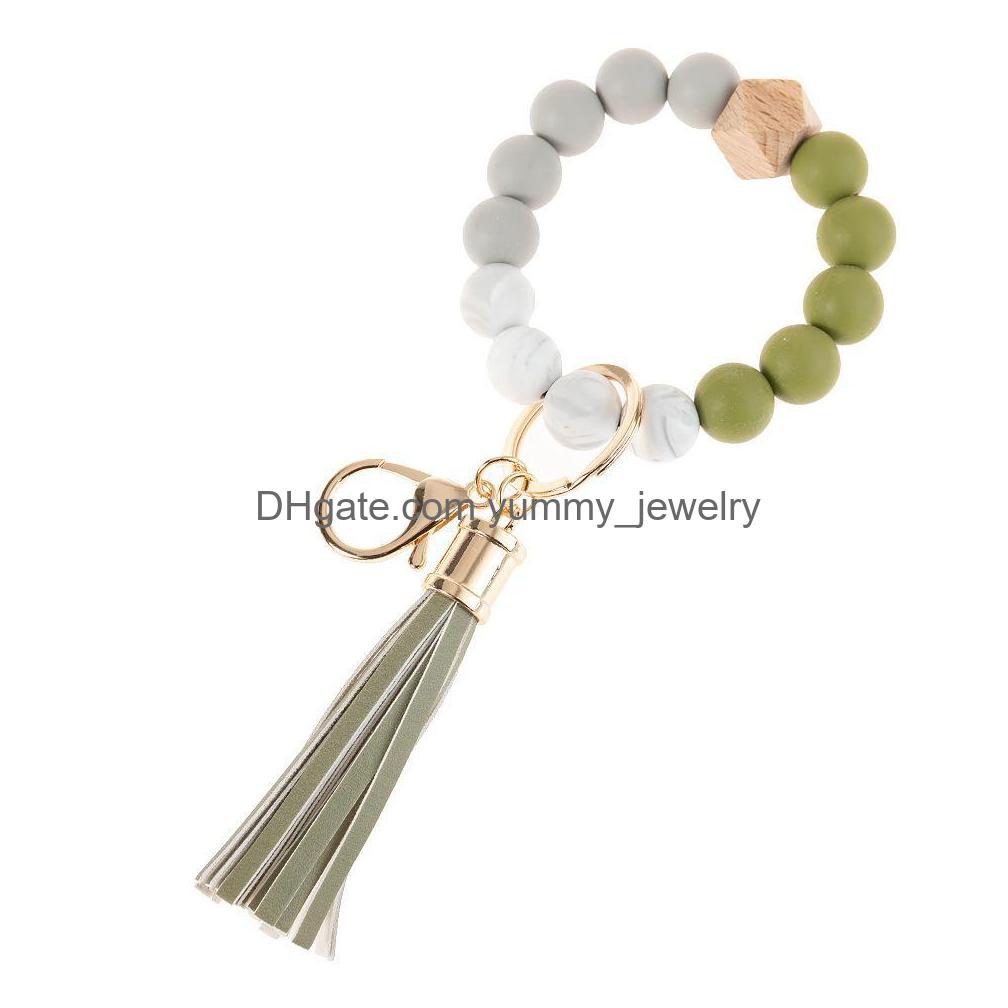 

Charm Bracelets Trendsetter Bracelet Leather Tassel Delicate Pendant Fashion Sile Beaded Key Chain Crossborder Style Drop Delivery Je Dh0I1