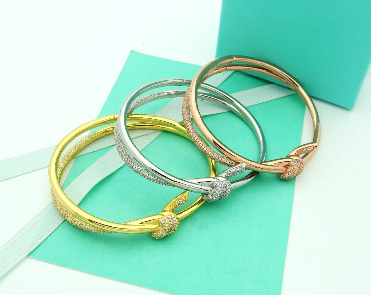 

Designer Bangle women Charm Bracelets stainless steel knotted glossy couple bracelets men's fashion jewelry