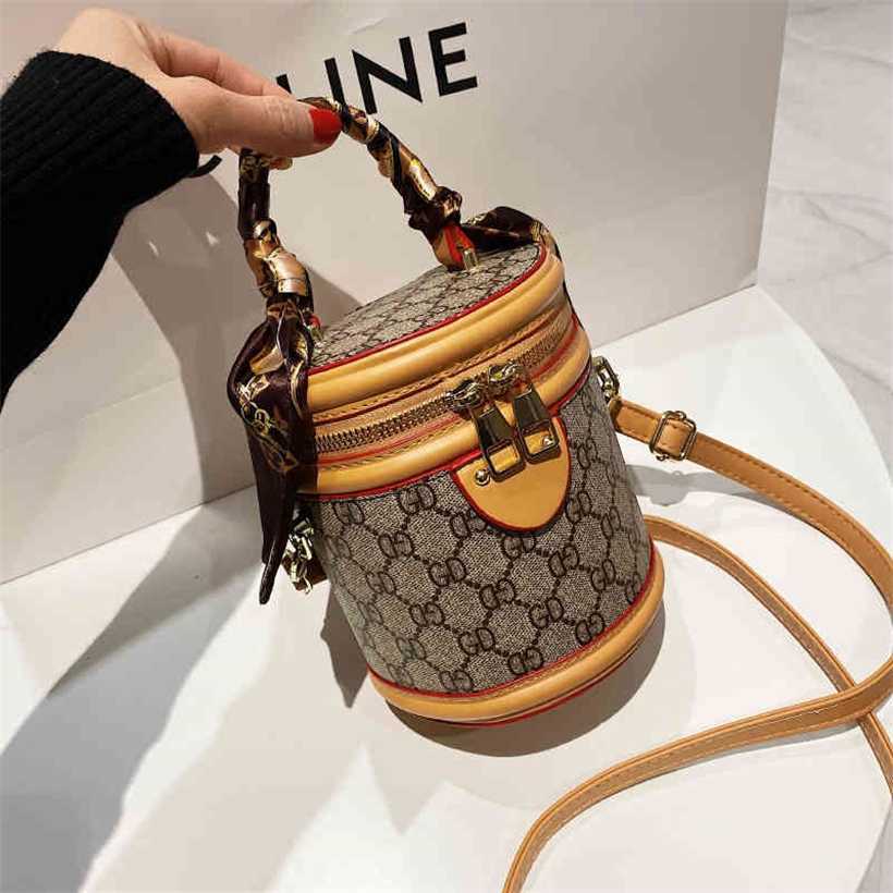 

20% OFF Handbag High quality 2023 new bag Shoulder Messenger portable bucket silk scarf old flower style women's, Letter black