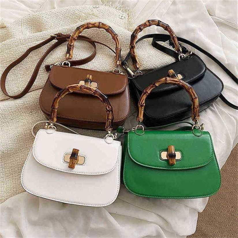 

10% OFF Handbag High quality 2023 new bag women's Shoulder Messenger hand sense Korean version popular semicircle trend women, White9