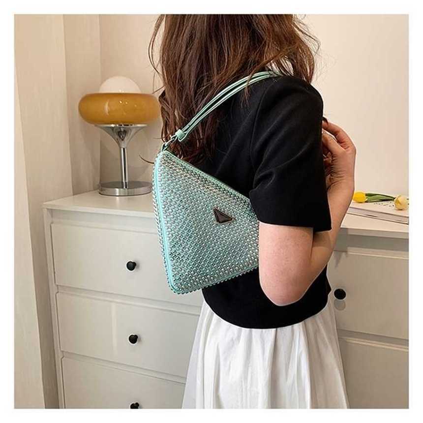 

24% OFF Handbag High quality 2023 new bag sense diamond women's spring and summer trend minority hand-held armpit messenger tide triangle, White8