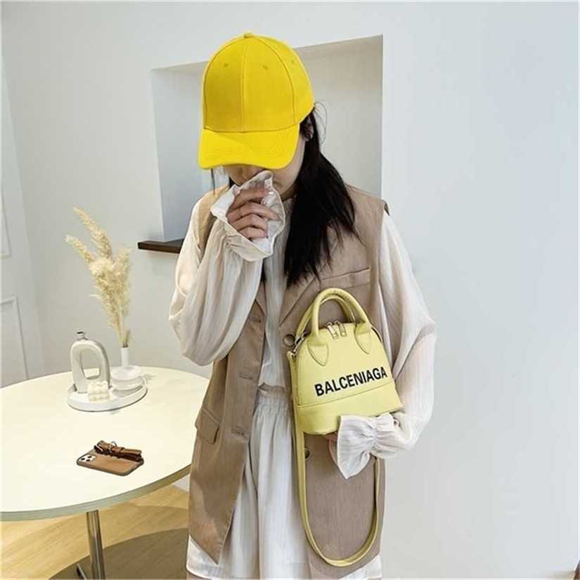 

10% OFF Handbag High quality 2023 new bag Shell Candy Letter, White13