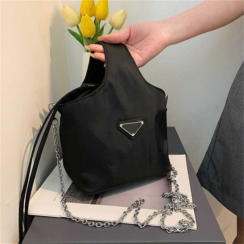 

10% OFF Handbag High quality 2023 new bag Women's simple vegetable basket damp nylon cloth hand drawstring bucket leisure chain shoulder diagonal, Black4