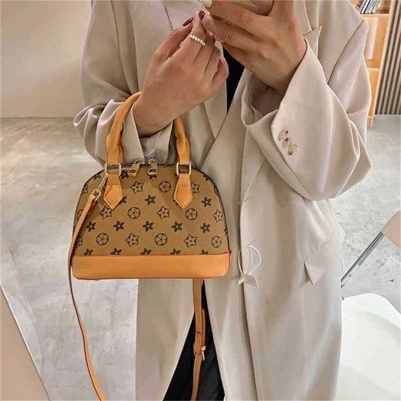 

10% OFF Handbag High quality 2023 new bag trend female textured Korean contrast color portable shell, Brown5