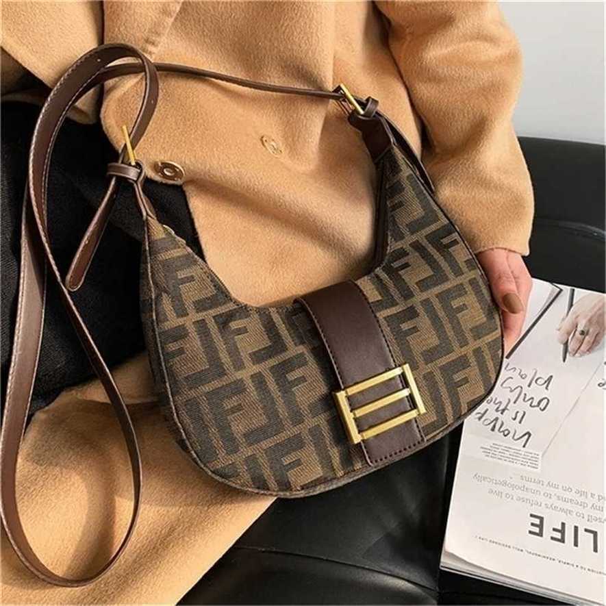 

28% OFF Handbag High quality 2023 new bag Club Saddle Armpit Canvas, Coffee