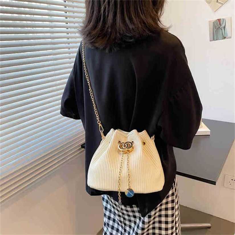 

10% OFF Handbag High quality 2023 new bag Women's Hot Vertical strip pleated drawstring daily commuting simple metal buckle, Black10