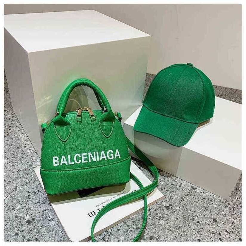 

10% OFF Handbag High quality 2023 new bag solid shell candy color letter simple hat matching women's Messenger, White17