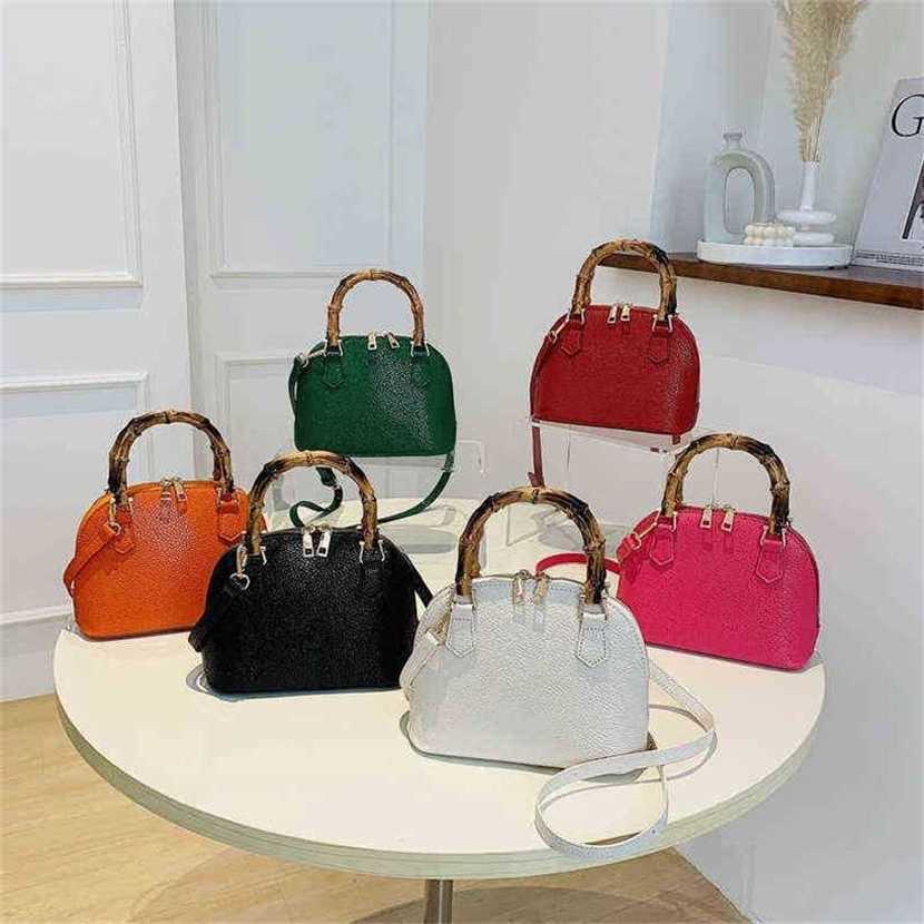

30% OFF Handbag High quality 2023 new bag Texture litchi shell bamboo hand red shoulder diagonal, White11