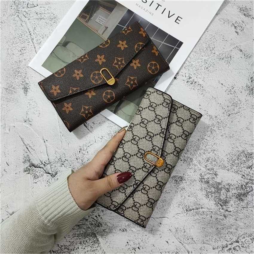 

22% OFF Handbag High quality 2023 new bag women's can be mixed batches and American printed long wallet retro personalized folding multi card holder clip, Reading