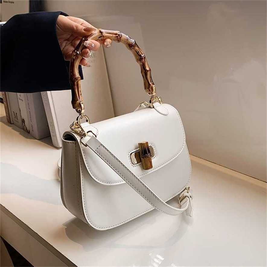 

28% OFF Handbag High quality 2023 new bag This year's popular small women's spring messenger hand-held armpit saddle, White9